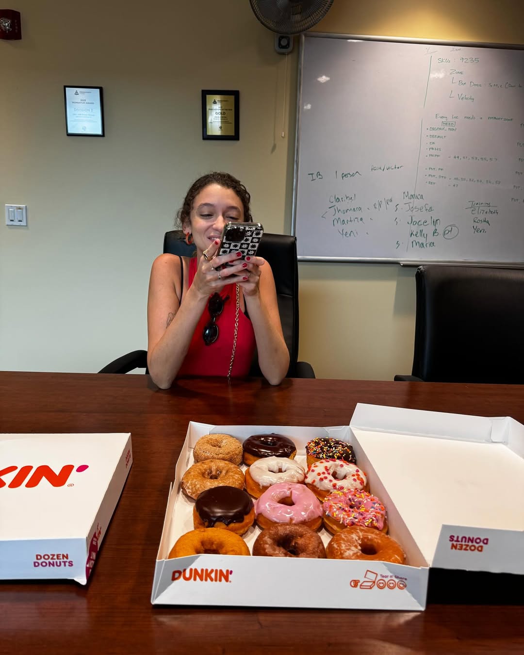 Person with a box of donuts